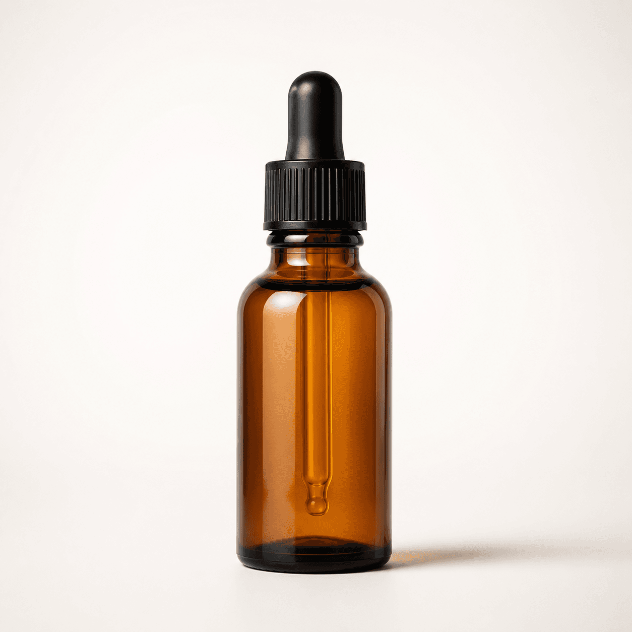 Amber dropper serum studio scene